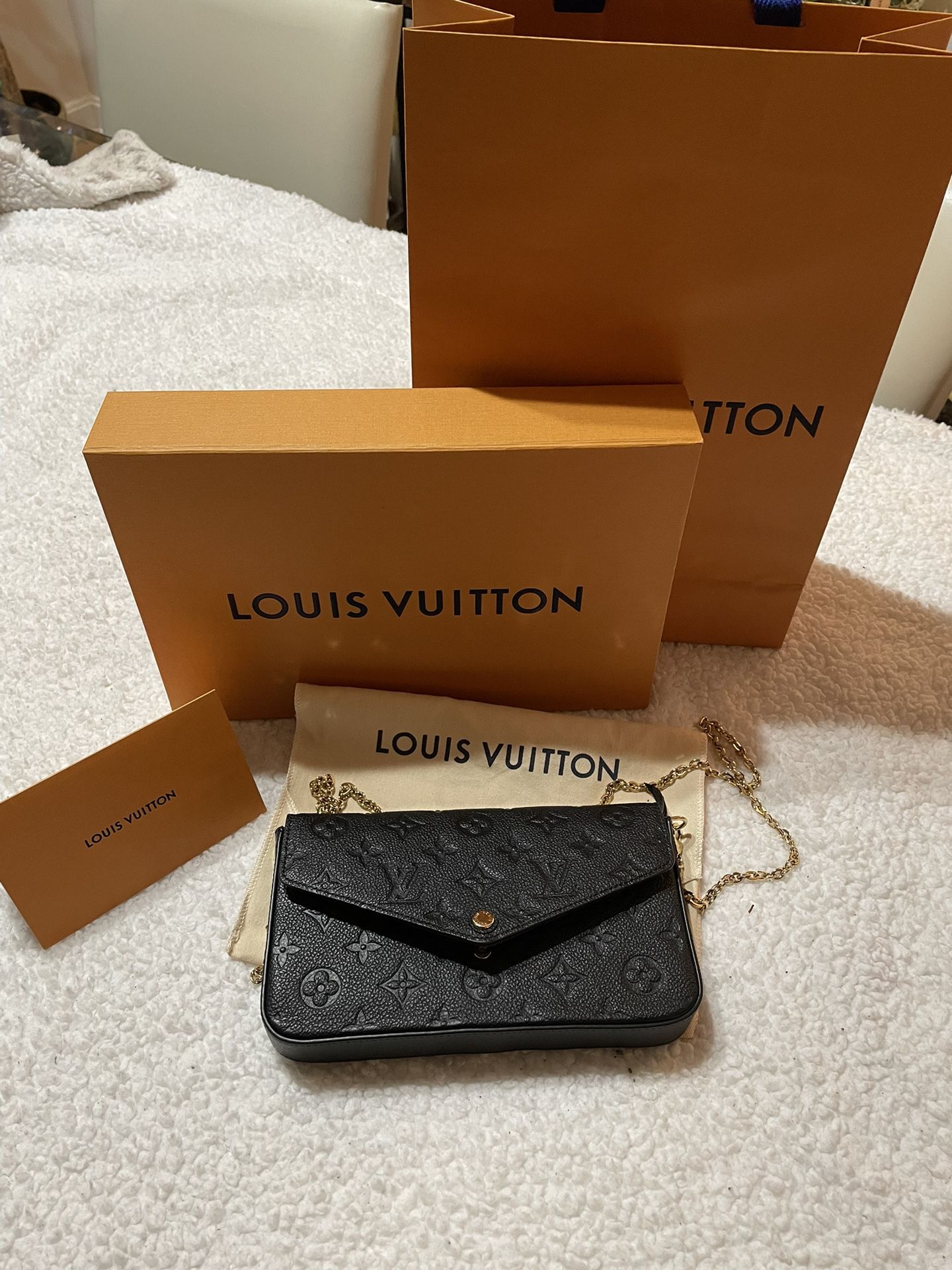 Louis Vuitton Felicie clutch Monogram Empreinte embossed supple