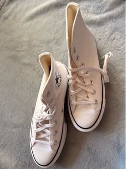 Converse Chuck Taylor All-Star high-top sneakers in classic white canvas size 7 women