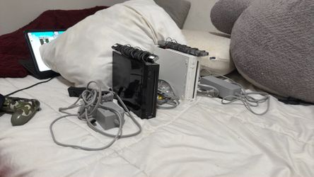 Nintendo Wii Consoles Black and White with Cables