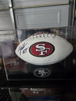 49er Autographed football in case