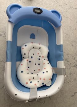Baby bath with temperature gauge