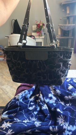 Green and black coach bag