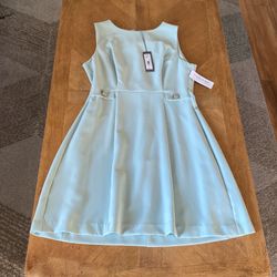 Size 12 woman’s dress Mint Color New dress never been worn.