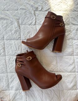 Brown high heels boots