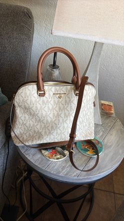 Michael Kors purse with Crossbody Strap also have a MK tan wallet for $15.00