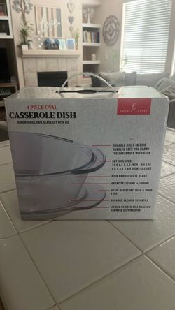 New in box Emeril Lagasse 4-Piece Oval Casserole Dish Set