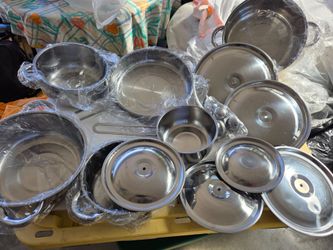 Stainless steel cookware set  , pots and pans with lids.