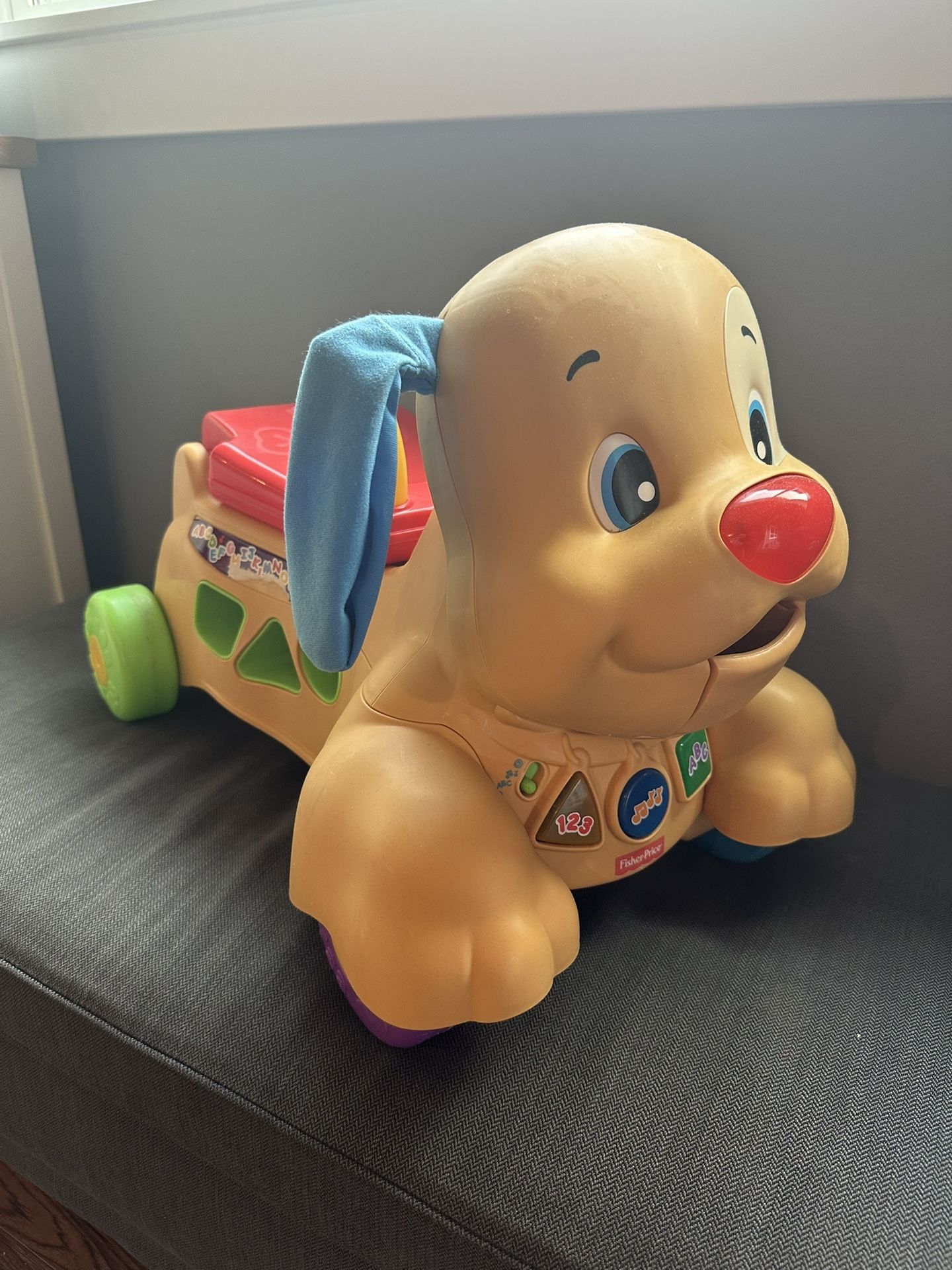 Fisher-Price Baby & Toddler Toy Laugh & Learn Stride-to-Ride Puppy Walker & Ride-On with Music Lights & Blocks for Infants Ages 9+ Months
