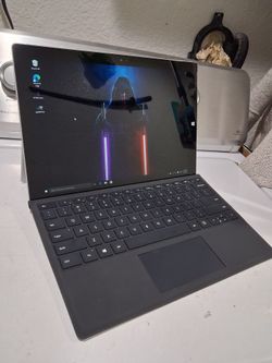 Microsoft  touchscreen  Surface pro 3.  Windows 10.  Intel core i5 - 4300U CPU processor.    Good working condition.   14 inches screen.  wifi. Webcam