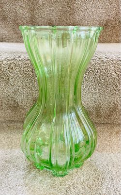 Vintage Indiana Glass light green ribbed vase with hourglass design. Glows under blacklight