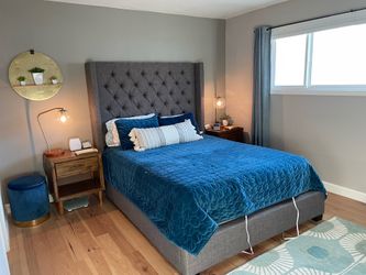 Gray upholstered queen headboard & bedframe