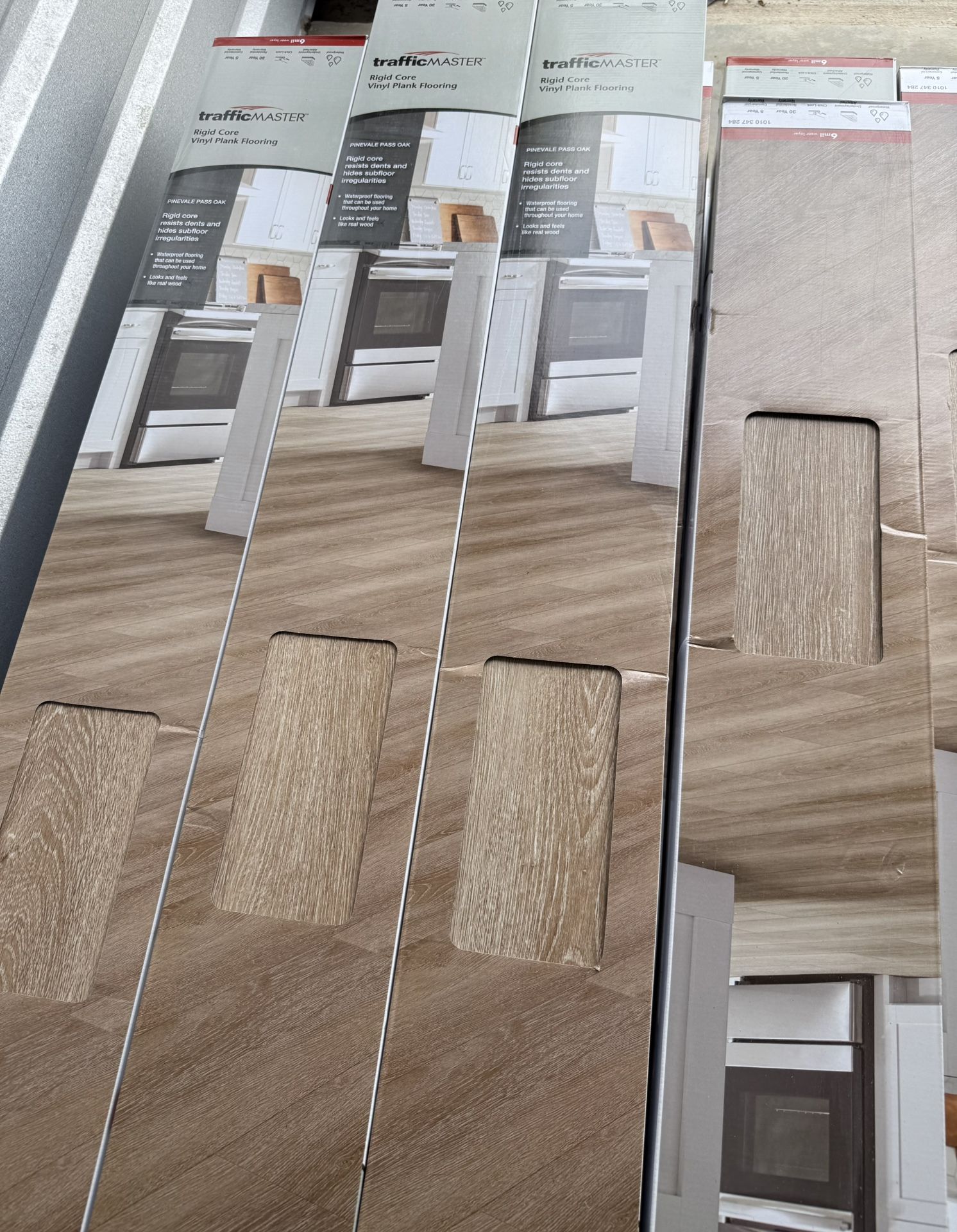 TrafficMaster Pinevale Pass Oak 6 MIL x 6 in. x 48 in. Waterproof Click Lock Vinyl Plank Flooring