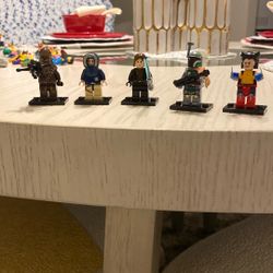 Lego 4 Star Wars And 1 Marvel Mini figs 