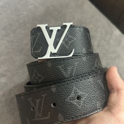 black belt with silver buckle