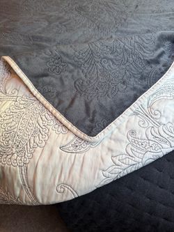 Dark Blue embossed paisley/damask quilt or bedspread.