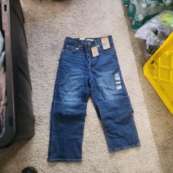 Levi's new size 28 measurements are in pictures 