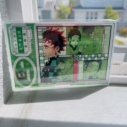 New Sealed Demond Slayer Tanjiro kamado figure Acrylic Stand exhibition   Size is around 5.7x3.75”   Free shipping inside USA  please allow 2-8 busine