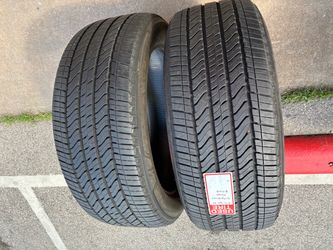 2 SEMI NEW 27550R22  BRIDGESTONE DUELER ALL SEASON tires for $270 installed and balanced. 99% TREAD ON THESE TIRES . 27550R22 275 50 22 275 50 R 22 27