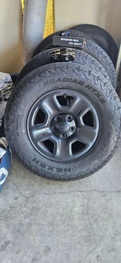 Jeep wrangler oem Mopar wheels with tires