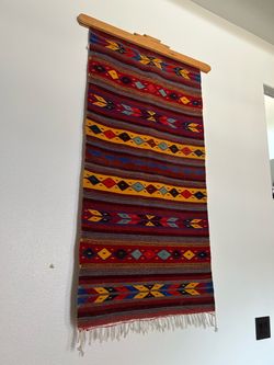 Rug with rug hanger