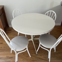extendable table and 4 chairs
