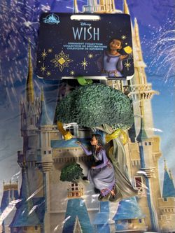 This Disney Sketchbook Ornament features characters Asha and Star