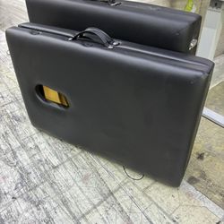 Black portable folding massage tables