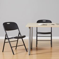 27-125 Amazon Basics Folding Plastic Chair, 350-Pound Capacity, Black, 2-Pack