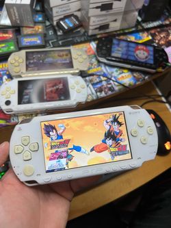 Psp console / games / charger / battery