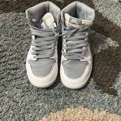 Jordan 1 High in a Wolf Grey / Neutral Grey–style colorway.