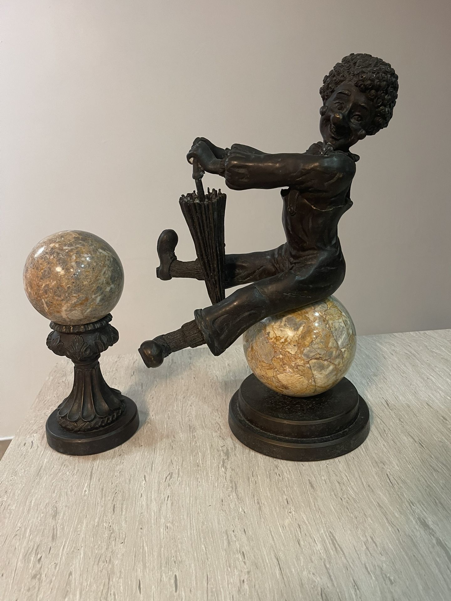 Antique figurines made of bronze and granite