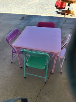 Brand new Kids table and 4 chairs