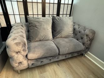 Two seat sofa with pillows