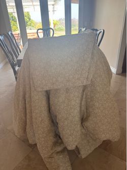 Cal King Comforter and two king pillow shams.