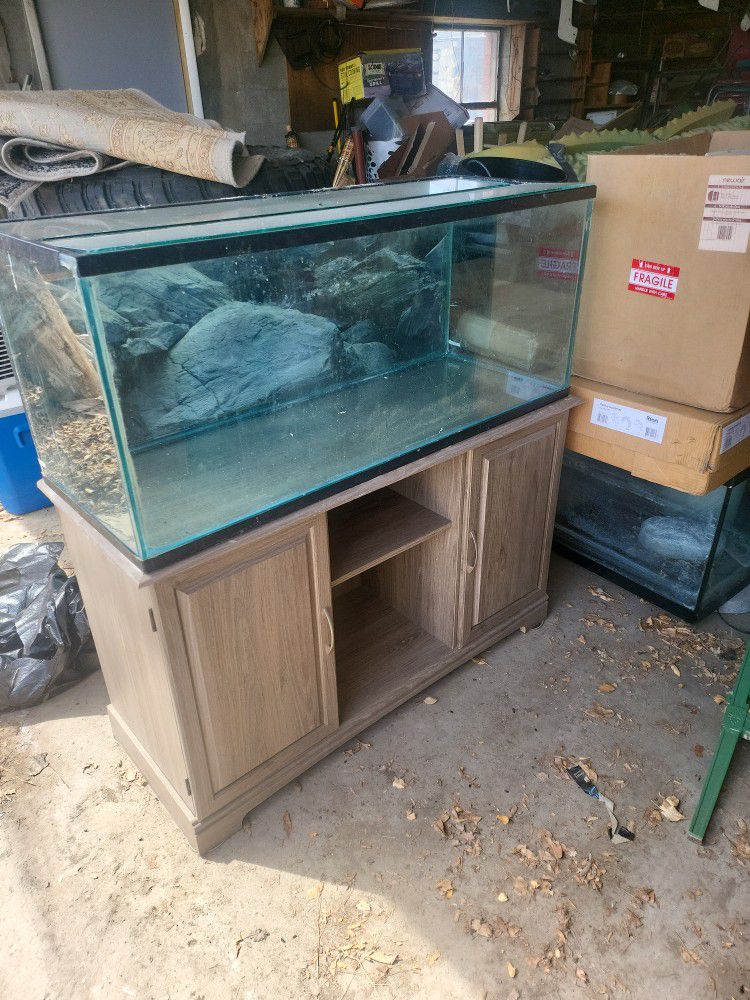 Two 50 To 75 Gal Tanks With One Stand. $200 (As Is. I Dont Wanna Haggle) 