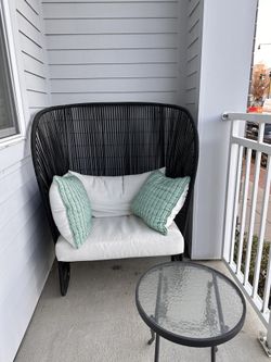Comfy Porch Chair With Pillow And Glass Table 