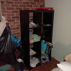 Book Case With 8 Cubbies And Very Good Condition 