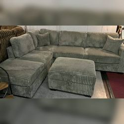 Gray Jumbo corduroy sectional sofa with two ottomans