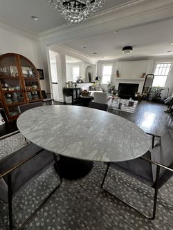 Williams and Sonoma Tulip Oval Pedestal Dining Table (70") Carrera marble top