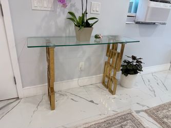 Modern stylish glass gold console