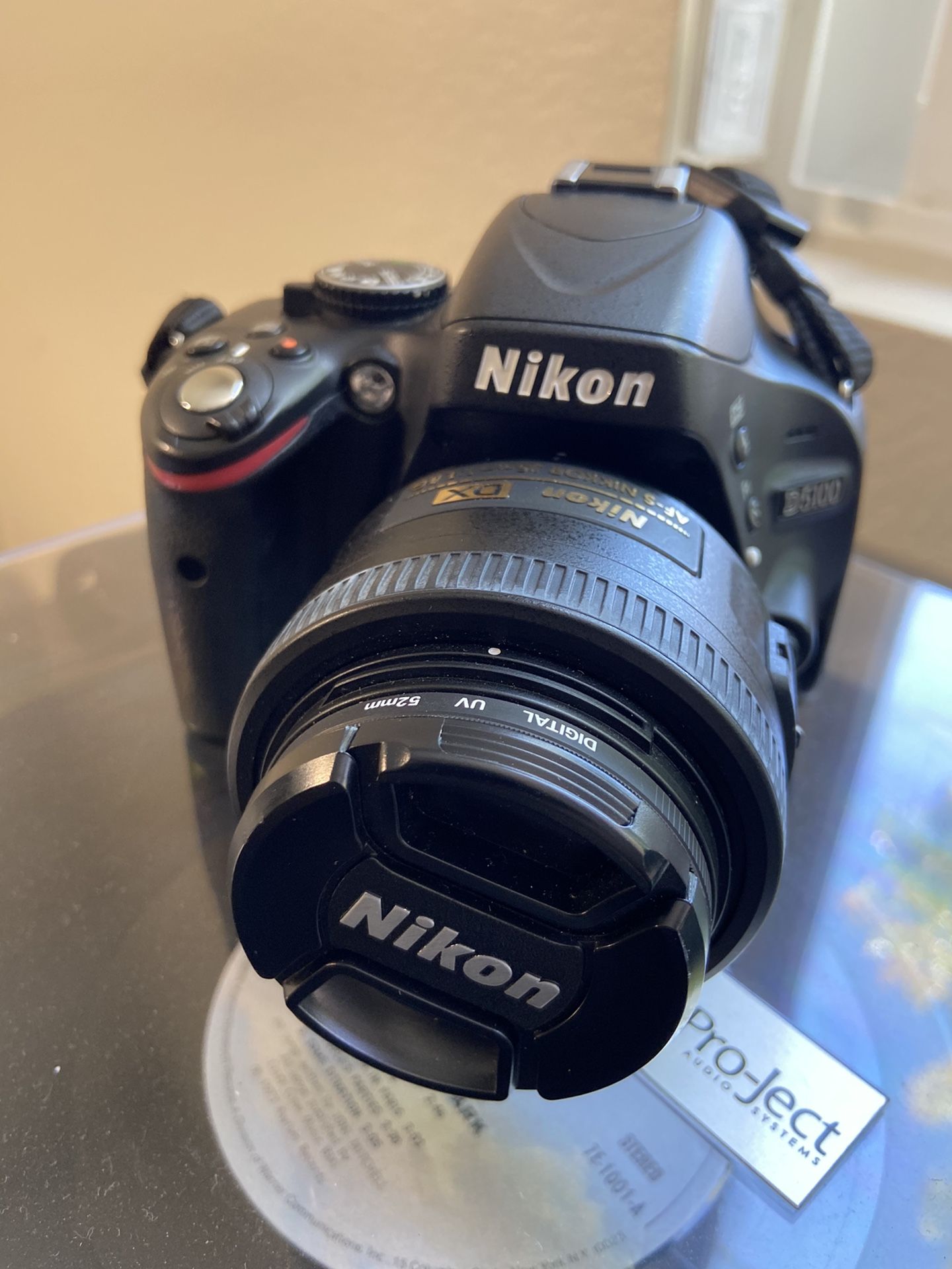 Nikon D5100 with 3 lenses, batteries, charger, & case