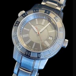 Tiffany & Co. Mark T-57 Men's Quartz Watch - Quartz. Stainlesseee Steel ( 42 mm )Unidirectional Rotating bezel.  7 3/4”Perfect working order