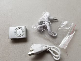 MP3 SILVER/ NOT INCLUDED MEMORY/ INCLUDEDS HEAPHONES CHARGER (NEW)