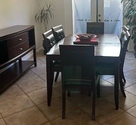Dark Wood Dining Table with 4 Chairs, Matching buffet table.