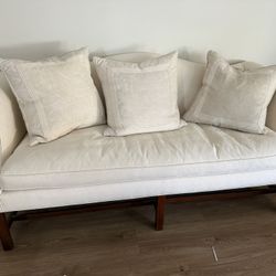 White Tapestry And Wood Couch