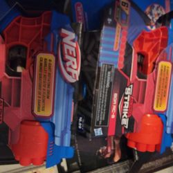 Two Nerf STRIKE guns