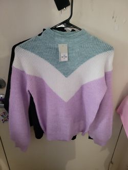 New Sweater Size Small /Medium