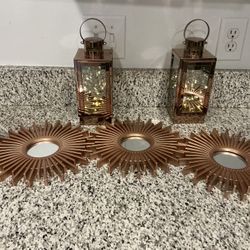 2 Rose Gold Lanterns And 3 Wall Mirrors