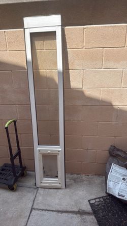 Sliding glass doggy door
