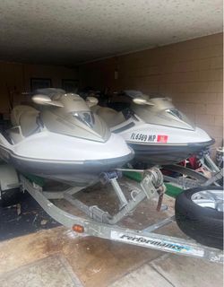 Two Sea-Doo Jet Skis with Double Trailer